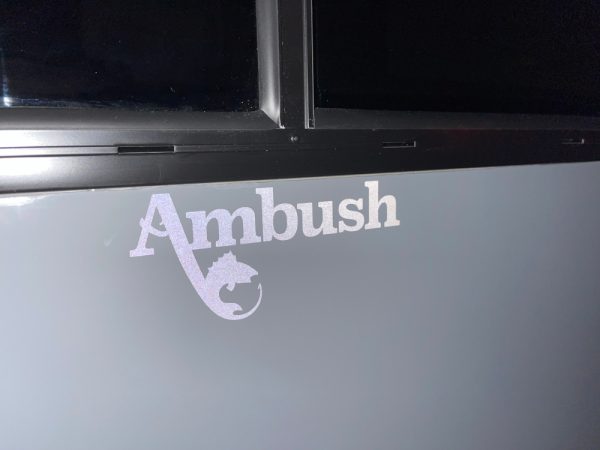 ambush logo on skid house